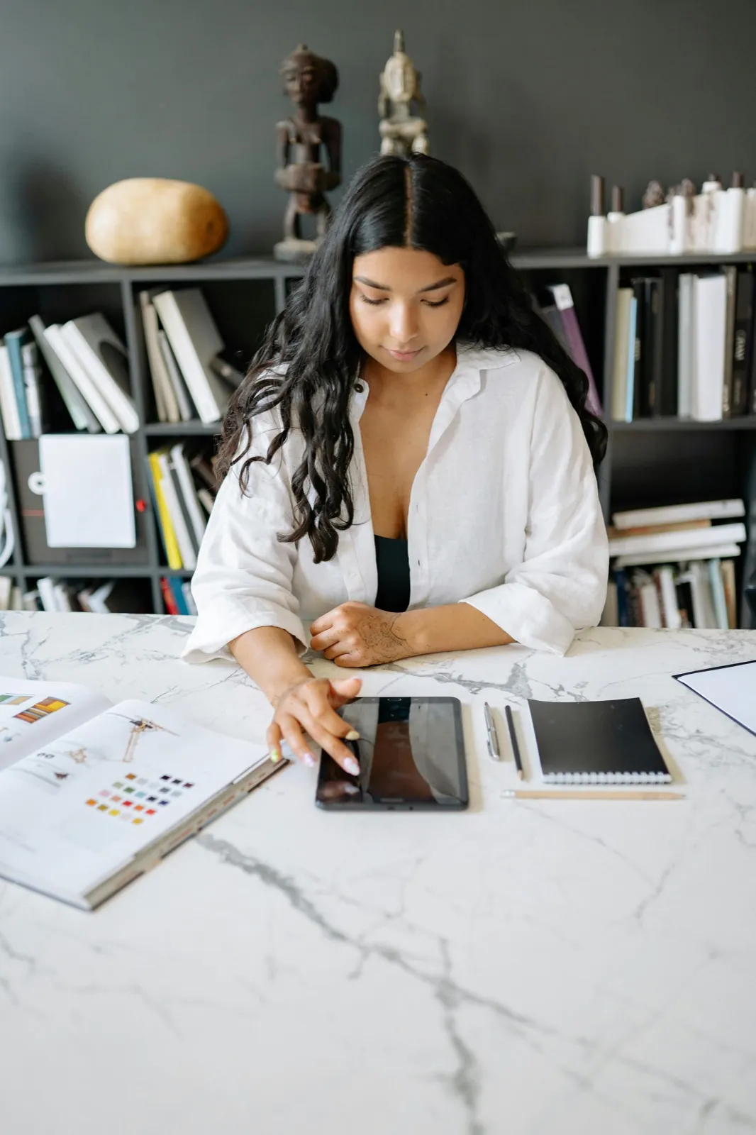 Tablet-based workflow representing digital enrollment verification