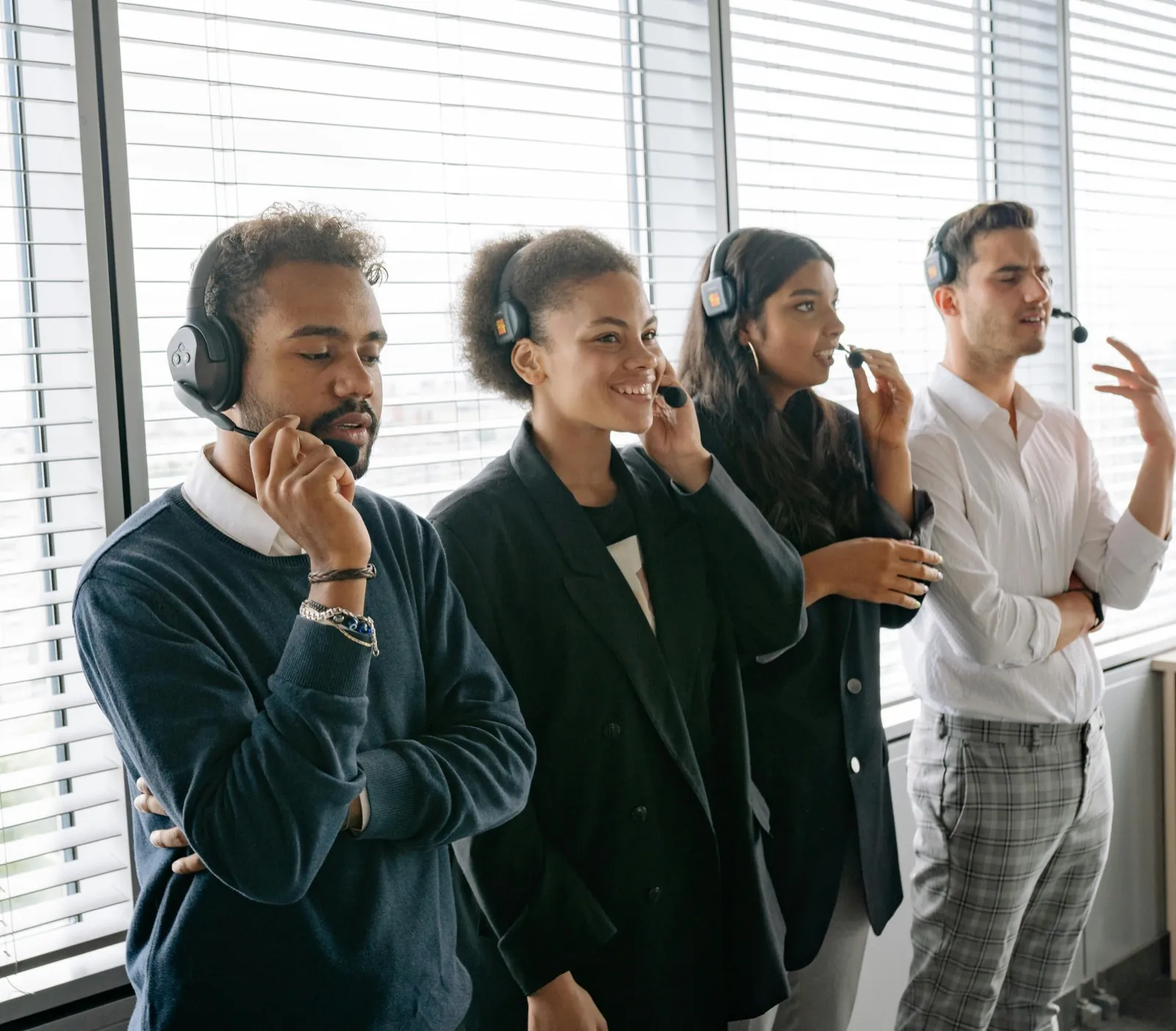 Live support team with headsets representing nearshore live-agent TPV services